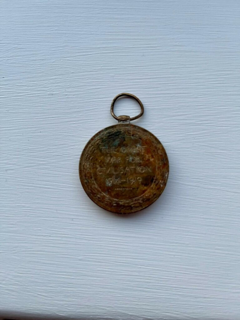 Face of a World War One Medal Found in a Skip - North West Recycling