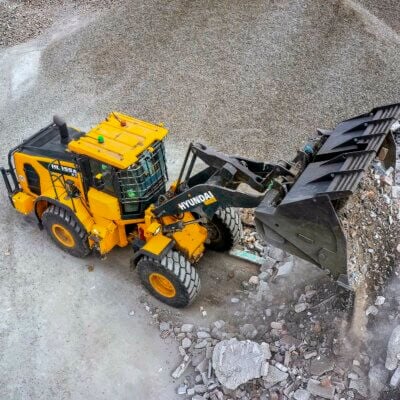 Renewi Waste Being Processed by a Hyundai excavator on site at North West Recycling