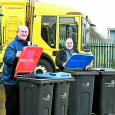 Two men presenting Dumfries & Galloway Council branded bins